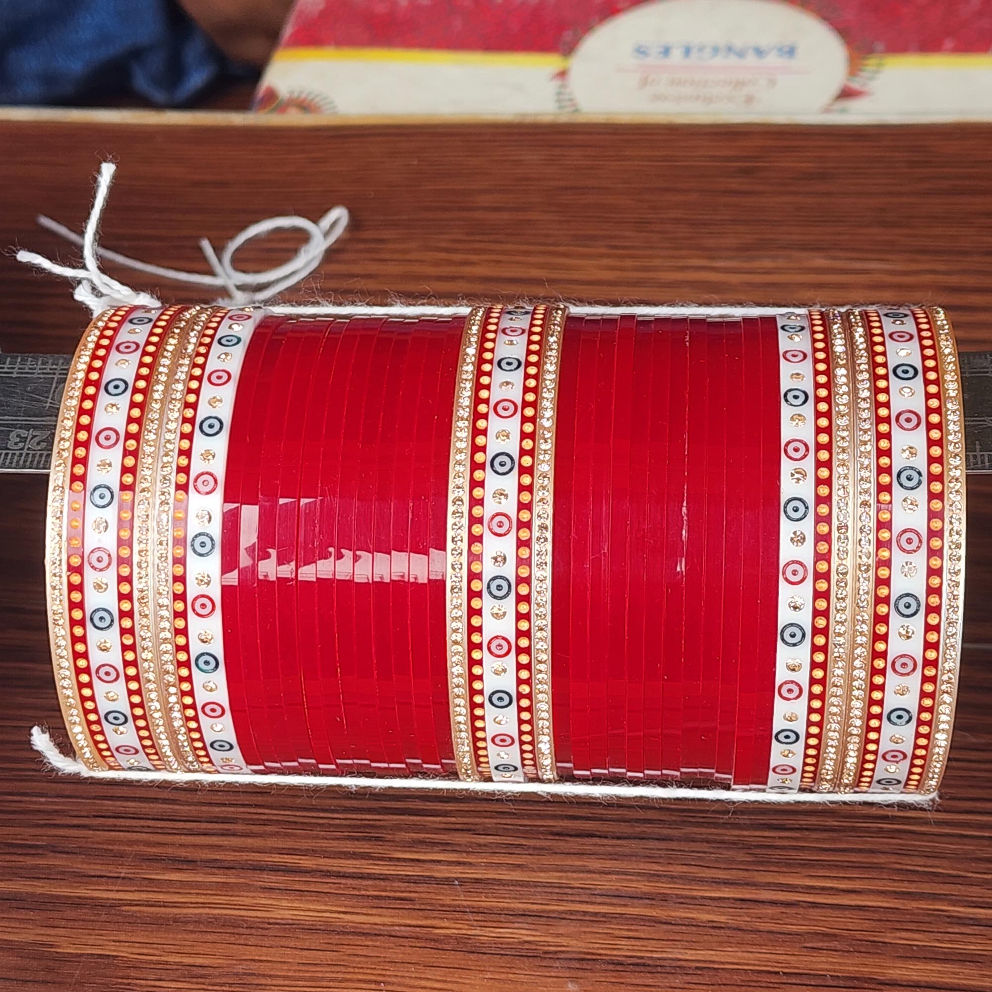 Traditional Red Bridal Chura & Bangle Set with White Rhinestone and Gold Detailing